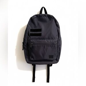 Herschel Men’s Gray Backpack With Front Pocket and Green Camo Interior